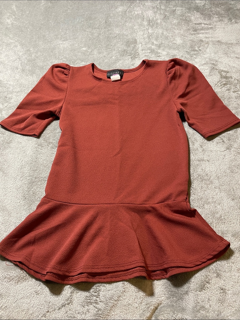 Discreet Rust Puff Sleeve Peplum Top